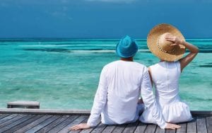 Father's Day photo, Man and Woman sitting at the beach.